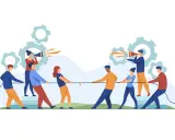 Menschen ziehen an einem Seil, symbolisch für politische Polarisierung. Zahnräder im Hintergrund deuten auf komplexe Mechanismen hin.