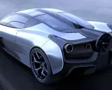 Der Gordon Murray T.50, ein Meisterwerk der Ingenieurskunst, zeigt seine aerodynamische Heckpartie mit markantem Lüfter und roten Rückleuchten.