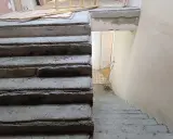 Surowe schody betonowe czekają na malowanie lastryko. Trwa remont klatki schodowej.