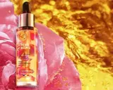 Flacon de **riche crème Yves Rocher** aux pétales de rose. Un choix luxueux pour votre peau.