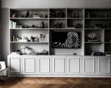 Elegant inbyggd bokhylla inspiration med zebra-konst, böcker och dekorativa föremål.