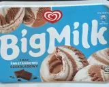 Opakowanie lodów Big Milk o smaku śmietankowo-czekoladowym z widocznymi porcjami lodów i kostkami czekolady.