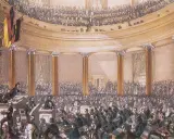 Versammlung im Paulskirchen-Saal, ein wichtiger Moment im zeitstrahl revolution 1848. Männer in Anzügen diskutieren lebhaft.