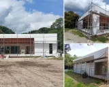 Casa moderna en construcción, con andamios. Averiguar cuanto cuesta construir una casa es clave para este proyecto.