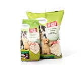 Deux sacs de riz pour chien Vadigran Rizi, avec des images de chiens et des indications "Optimal digestion", "Low calorie", "All dogs".