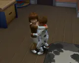 Dzieci w piżamkach przytulają się. W The Sims 4, aby zrobić dziecko, potrzebujesz dorosłych Simów i łóżka.