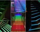 Schody z zielonym, tęczowym i niebieskim podświetleniem pokazują różnicę między RGB a RGBW w oświetleniu.