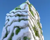 Edifici ecosostenibili con facciate a blocchi bianchi e vegetazione rigogliosa che si intreccia, sotto un cielo azzurro.