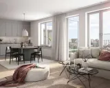 A bright, modern living room and kitchen with a dining table, sofa, and large windows.