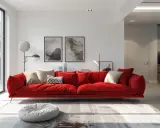 Un canapé rouge éclatant, orné de coussins aux tons neutres, invite à la détente. Une question se pose : quelle couleur associer avec un canapé rouge pour un intérieur harmonieux ?
