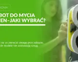 Robot do mycia okien z dwoma obrotowymi padami czyszczącymi na szkle.