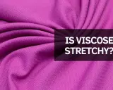 A close-up of a vibrant purple fabric with soft folds. Text overlay asks: "IS VISCOSE STRETCHY?