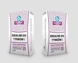 Dwie torby wapna budowlanego Classic Extra, idealne do tynków. Opakowania po 25 kg.