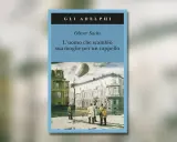 Copertina del libro "L'uomo che scambiò sua moglie per un cappello" di Oliver Sacks. Un'illustrazione surreale con un dirigibile e figure che alzano le mani verso il cielo.