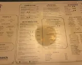 Meny med "Paddy's recensioner" som en del av menyn, med rätter som Gold Angus Ryggbiff och Paddys Smashburgare.