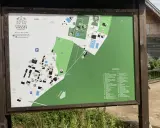Mapa z zaznaczonymi **ciechanowiec atrakcje** w Ziołowym Zakątku Koryciny. Widoczne budynki, ogrody, stawy i inne punkty.