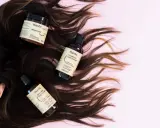 Capelli scuri e luminosi con prodotti Naste: maschera, shampoo e balsamo. Scopri la differenza tra balsamo e maschera per una chioma perfetta.
