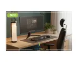 Bureau moderne avec écran, clavier, souris, lampe et chaise ergonomique. L'éclairage ambiant assure un excellent indice de rendu des couleurs pour le travail.