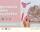 Kolorowa czapka na szydełku, gotowa do noszenia. Obok szydełko, nożyczki i motek włóczki. Idealna dla początkujących!
