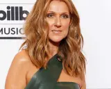 Céline Dion, känd för sina många syskon, poserar vid Billboard Music Awards.
