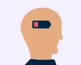 Profil av ett huvud med ett batteri inuti som visar låg laddning, en symbol för emotionell utmattning.