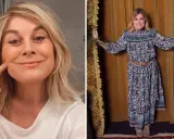 Pernilla Wahlgren ler och pekar på sitt ansikte. Hon bär en mönstrad klänning och ser glad ut.