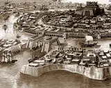 Eine antike Stadt mit Kanälen, Schiffen und monumentalen Gebäuden. Stell dir vor, gab es Atlantis wirklich?