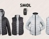 Dwustronne kurtki i kamizelki puchowe SMOL w kolorach czarnym i jasnoszarym.