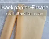 Zwei aufgerollte Bögen braunes Papier, die als Backpapier-Ersatz dienen. Nachhaltige Alternativen für die Küche.