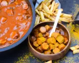 Currywurst im Dutch Oven mit Pommes. Ein Klassiker, der immer schmeckt!