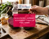 Jak zrobić syrop z buraka na kaszel i wzmocnienie? Na drewnianej desce leżą buraki, miód i cukier. Przepis od Pana Tabletki.