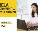 Tabela czasowników nieregularnych, darmowy PDF. Młoda kobieta uczy się angielskiego przy laptopie. Zobacz!