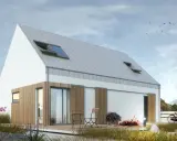 Nowoczesny dom z drewnianymi elementami i szarym dachem, przypominający architektoniczny monolit. Na tarasie stolik i krzesło.