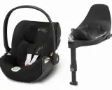 Elegancki czarny fotelik samochodowy Cybex z bazą Isofix. Złote detale dodają luksusu.