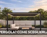 Moderna pergola con illuminazione LED e divano angolare in un giardino curato. Idee pergolato giardino per creare uno spazio relax.