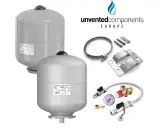 Dos vasos de expansión de presión para ACS, uno más grande y otro más pequeño, junto a accesorios de montaje y un manómetro.