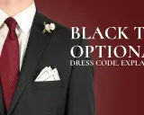 A man in a dark suit, white shirt, and red polka-dot tie, with a boutonnière and pocket square. Text reads "BLACK TIE OPTIONAL".