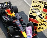 Formel 1 Rennwagen mit Porsche-Logo. Der Wagen trägt die Startnummer 1 und das Porsche-Wappen von Stuttgart.