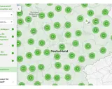Deutschlandkarte zeigt Biogasanlagen, die aufbereitetes Biogas ins Gasnetz einspeisen. Viele grüne Kreise markieren Standorte in Deutschland.