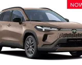 Nowa Toyota Corolla Cross w kolorze brązowym, stylowa i ekologiczna toyota hybryda, idealna na miejskie wyprawy.