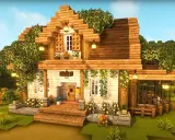 Uroczy, drewniany dom z Minecraft, otoczony zielenią i kwiatami. Idealny pomysł na dom w Minecraft dla miłośników natury.