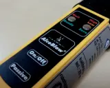 Alkomat AlcoBlow - gdzie można sprawdzić trzeźwość. Wskaźniki "Wait", "Ready", "High", "Low", "Zero" i przyciski "On/Off", "Passive".