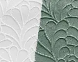 Papier peint en relief, moitié blanc, moitié vert, avec un motif de feuilles stylisées. Idéal pour peindre sur papier peint relief.