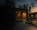 Nowoczesna budowa domu modułowego o minimalistycznej architekturze, oświetlona ciepłym światłem o zachodzie słońca.