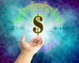 Znak dolara unosi się nad dłonią na tle koła zodiaku. Czy to zapowiedź sukcesu w pracy dla Ryb?