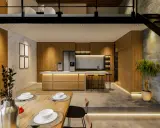 Cuisine moderne et salle à manger dans un **souplex def**. Bois, marbre et béton créent une ambiance chaleureuse. Éclairage LED subtil.