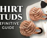 Learn how to wear tuxedo shirt studs with this definitive guide. Features knot-style studs on a formal shirt.