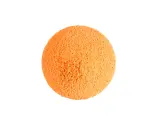 Une balle de nettoyage orange, texturée et spongieuse, prête à faire briller votre maison.