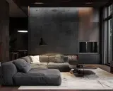 Salon moderne avec canapé gris, table basse design et éclairage tamisé. Une ambiance feutrée synonyme de détente.