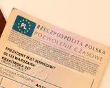 Dowód rejestracyjny motocykla z Warszawy, wydany przez Prezydenta m.st. Warszawy. Dokument zawiera dane pojazdu i jego właściciela.